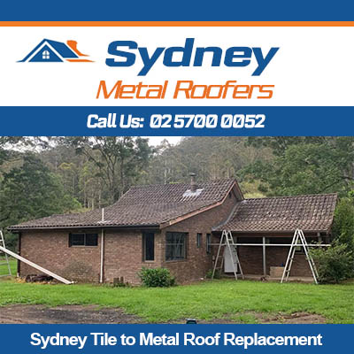 Dark metal roof replacing tiles on brick home in Sydney